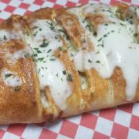 Cheese Calzone · With mozzarella and ricotta cheese.