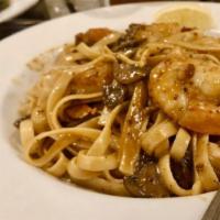 Capellini Checca Con Gamberi · Angel hair pasta with tomatoes, basil, and shrimp.