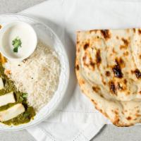 Palak Paneer · Palak paneer spinach cooked with Indian cheese.