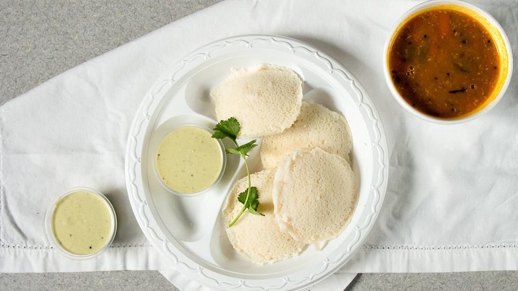 Iddly · One Plate has four iddlys. Steamed rice and gram beans flour cakes.