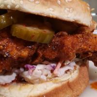 Pacific Hot Chicken Lunch Box · Our Hot Chicken Sandwich covered in a smoky/sweet/spicy blend of chiles, with one small side...