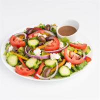 Mediterranean Salad · Romaine lettuce, tomato, red onion, feta cheese, black olives, cucumber, bell peppers. Balsa...