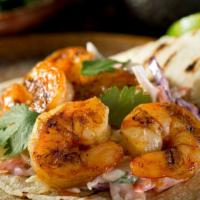 Grilled Shrimp Taco · Freshly grilled shrimp with melted cheese topped with pico de gallo and sauces.