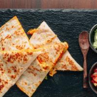 Carnitas Quesadilla  · Large flour tortilla filled with cheese and freshly grilled carnitas!