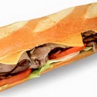 Roast Beef & Cheese Baguette Sandwich · Served on a ten-inch baguette. Includes cheese (your choice), lettuce, tomato, and mayonnais...