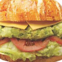 Veggie Avocado Croissant Sandwich · Includes cheese (your choice), lettuce, tomato, and mayonnaise. Dill pickle spear, pepperonc...