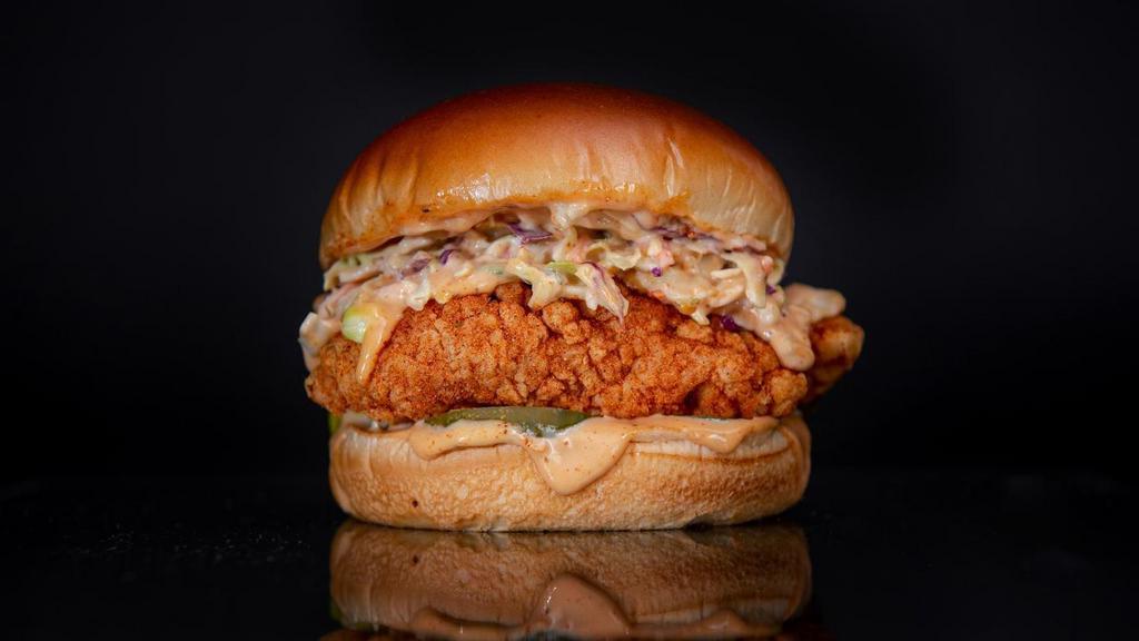 The Original Sam'S Crispy Chicken Sandwich · Cornflake Crusted Chicken Breast seasoned in our signature spice blend in between a toasted brioche bun with pickles, cole slaw, and classic Sauce.