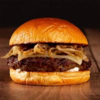 The Truffle Burger · Beef patty, caramelized onions, truffle mayo, and melted swiss cheese on a brioche bun.