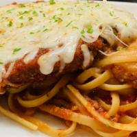 Chicken Parmigiana · Breaded chicken breast, marinara, mozzarella, spaghetti Mama Rosa , fresh parmigiano.
