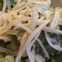 Caesar Salad · Romaine lettuce, homemade garlic herb croutons, Parmesan cheese tossed in our garlic caesar ...