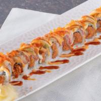 Atomic Bomb Roll · spicy tuna , cream cheese, tempura shrimp, japansese shiso mint , tuna, deep fried, topped w...