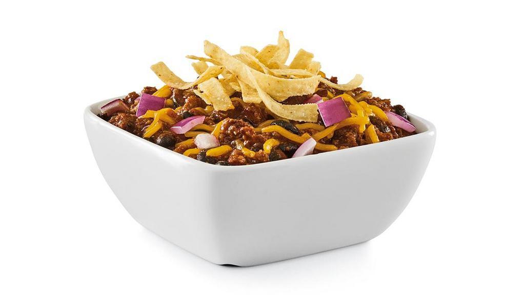 Red’S Chili Chili™ · Ground beef simmered with spices, beans and peppers. Topped with Cheddar, red onion and tortilla strips.