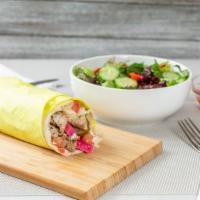 Chicken Shawarma Wrap · Served in a warm fresh pita, marinated chicken, tomato, pickled turnips, and house pickled c...