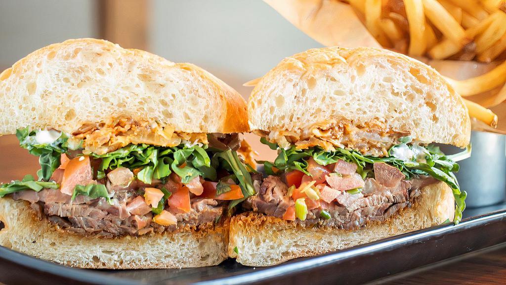 Steak House Tri-Tip Sandwich · Smoked natural tri-tip, fried onion, arugula, mayo, ,  salsa, house-made steak sauce, Italian roll.