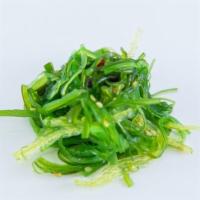 Seaweed Salad · Side container of seaweed salad.