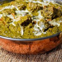 Saag · Seasoned pureed spinach cooked with fresh herbs and spices