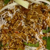 Biryani · Slow cooked basmati rice with special spices and herbs. topped with nuts and raisins. 
Serve...