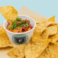 Poke & Chips · (raw) Choice of ahi or salmon and poke sauce, scallion, tortilla chips