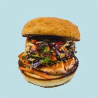 Salmon Burger · Filet of salmon, soy-citrus lettuce-cabbage slaw, carrot, cucumber, bell pepper, brioche bun