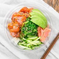 Poke Bowl · (raw) Sushi rice, choice of poke & sauce, nori, seaweed salad, cucumber, pickled ginger, ses...