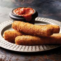 Mozzarella Sticks · Hand-breaded in herb-panko breadcrumbs, lightly fried and served with basil marinara sauce