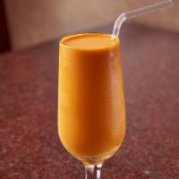 Mango Lassi · Yogurt drink with mango fruit and sugar.