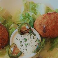 Jalapeño Poppers · Jalapeño Poppers
Fried balls stuff with three cheese blend, cream cheese and grilled Jalapeñ...