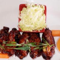 7 Afro Wings  · w/ carrots, celery, sesame seeds, green onions, Ranch sauce.