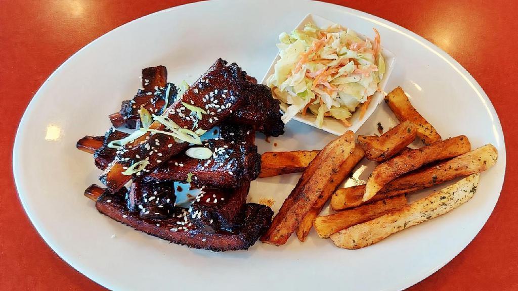 Chulla’S Afro Ribs · Glazed, grilled/slow-cooked pork ribs with coleslaw with Fries or Rice.