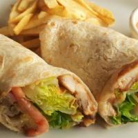 Afro Turkey Shawarma · Diced cheddar and swiss cheese, roasted onions and bell peppers, tomato, avocado, spinach, b...
