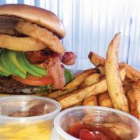 Hungry Lion Burger · 2 meat patties, pickles, lettuce,tomato, avocado, 2 onion rings,bacon,cheddar and Swiss chee...