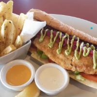 Chulla’S Fish Sandwich*Pollock* · w/ pickles, lettuce, tomato, red onion, avocado, Swiss cheese, and Signature sauce and Tarta...