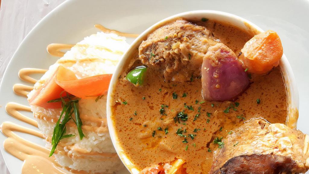 Tanjier Stew · *contains peanuts.* w/ choice of Beef, Pork, Chicken, Whole Fried Red Snapper.