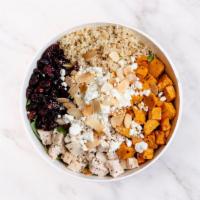 The Friendly Goat Salad · Arugula, roasted sweet potatoes, goat cheese, roasted sliced almonds, dried cranberries, bal...