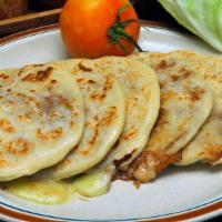 Pollo Con Queso Pupusas · Chicken with cheese.
Pupusas are only served with 
salsa and pickle cabbage only