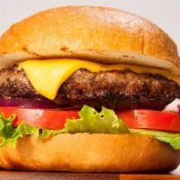 Cheeseburger · A juicy char-grilled chop house hamburger with cheese, grilled onions lettuce, tomatoes and ...