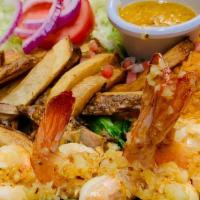 Camarones Al Mojo De Ajo · Jumbo shrimp cooked with butter and fresh garlic served with rice, beans, salad, and French ...