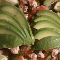 Botana De Ceviche · Fish or shrimp cooked in lime juice, tomatoes,  cilantro, onions, avocado, and lemon