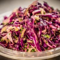 Red Cabbage Salad · Red Cabbage, Tossed with Fresh Lemon Juice, Spices and Olive Oil.