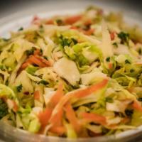 White Cabbage Salad · Fresh Lemon Juice, White Cabbage and Carrots tossed with Spices.