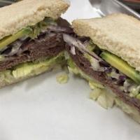 Roast Beef Sandwich · Comes with mayonnaise mustard lettuce tomatoes red onions and pickles. served with choice of...