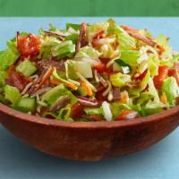 Italian Chopped Salad · Salami, romaine lettuce, tomato, cucumber, shredded carrots, smoked ham, mild peppers, olive...