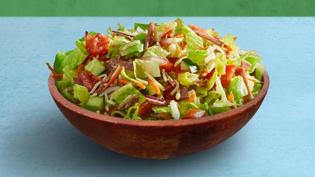Italian Chopped Salad · Beef salami, romaine lettuce, tomato, cucumber, shredded carrots, and shredded cheese tossed with your choice of dressing.