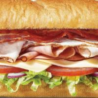 All-American Club® 6 Inch Regular Sub · The All-American Club® is a delicious combo of oven roasted turkey, Black Forest ham and hic...