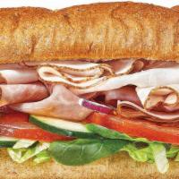 Oven Roasted Turkey & Ham Footlong Regular Sub · Enjoy the flavor of tender, thin-sliced oven roasted turkey and Black Forest Ham with your f...