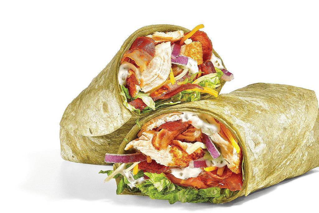 Chicken & Bacon Ranch · This crave-worthy wrap has it all: hand-pulled, Rotisserie-Style Chicken, smothered in shredded Monterrey Cheddar Cheese, Hickory-Smoked Bacon, and Peppercorn Ranch, folded in a Spinach wrap.