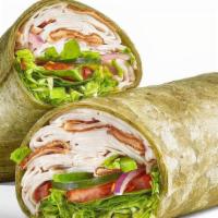 Oven Roasted Turkey · Our Oven Roasted Turkey Wrap is a go-to. It's a footlong portion of our premium, thin-sliced...