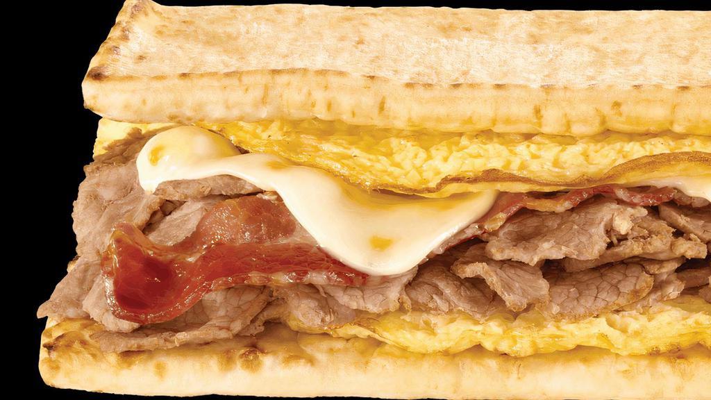 Steak, Egg & Cheese Footlong With Regular Egg · No matter what side of the bed you wake up on, you’ll love this. Yummy egg  with tender and delicious steak covered in melty cheese. That's one beautiful breakfast.