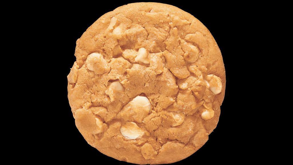 White Chip Macadamia Nut · Chunks of Macadamia nuts and white chips in a ridiculously delicious cookie.