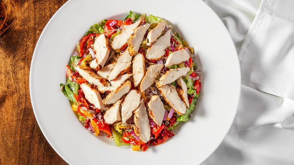 Bistro Chicken · Fresh bistro salad with roasted red, yellow, and green bell peppers, red onions, and sun-dried tomatoes. Topped with grilled chicken breast, Parmesan cheese, sunflower seeds, and served with balsamic vinaigrette.